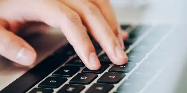 Fingers on keyboard